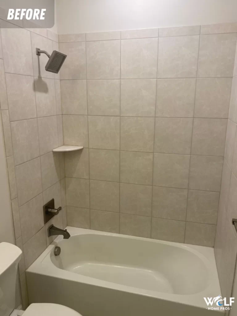 Bathroom before remodeling in West Chester, PA with an existing tub and tiled shower surround.
