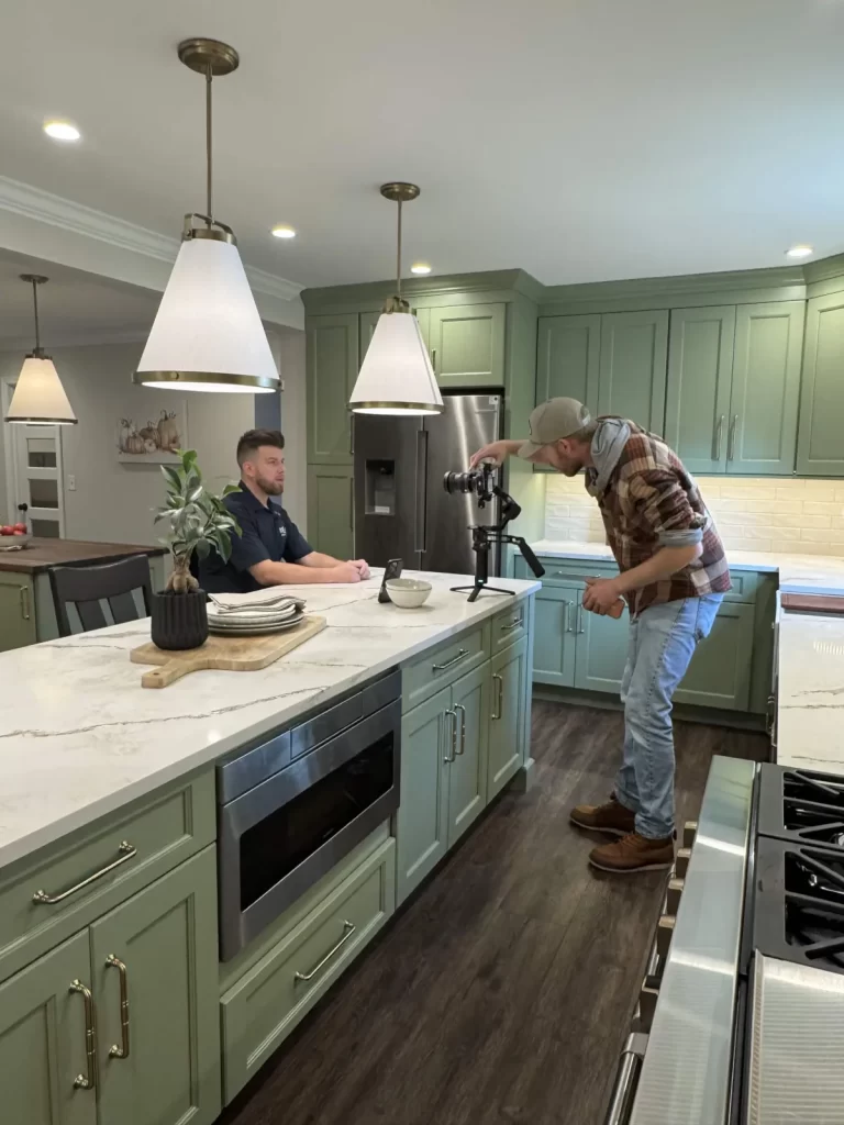 Dan Wolf being filmed during a behind-the-scenes shoot in a completed Coatesville, PA kitchen remodel.