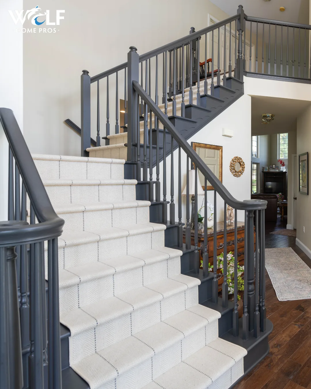 Custom staircase and railing by Wolf Home Pros in Avondale, PA, with new stair railings, balusters and second-floor railing.